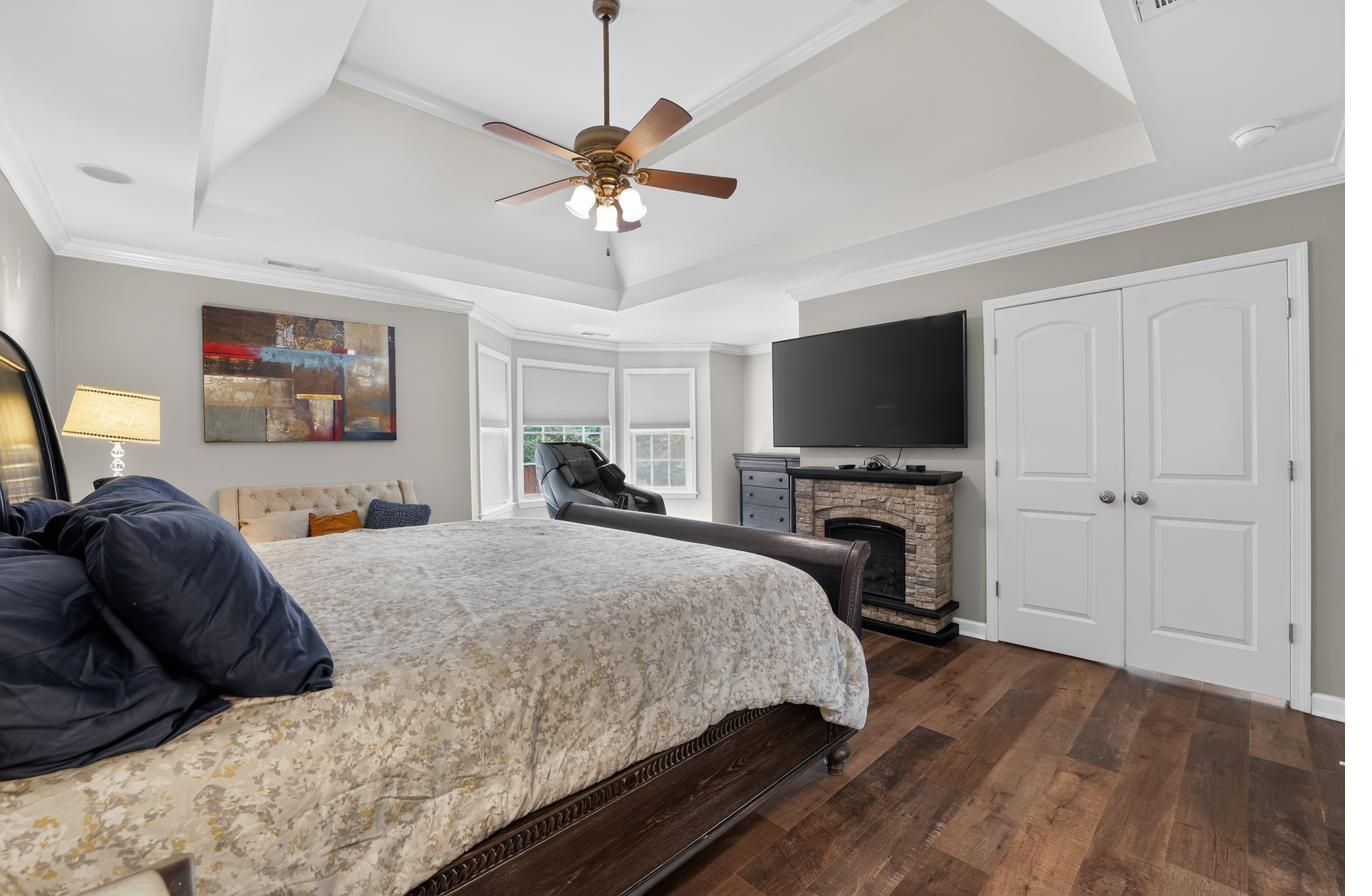 Primary suite with tray ceiling and sitting nook